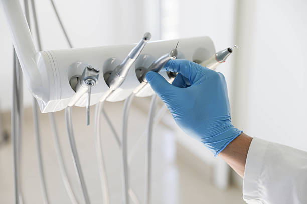 Professional Root Canal Treatment technician working in North Liberty, IA